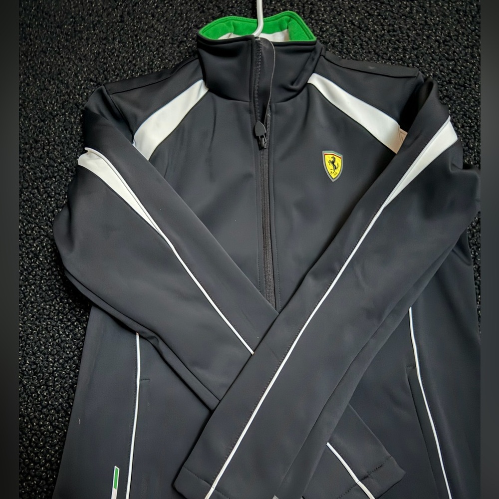 Ferrari Black Jacket with White Accents
Wind proof 
Waterproof